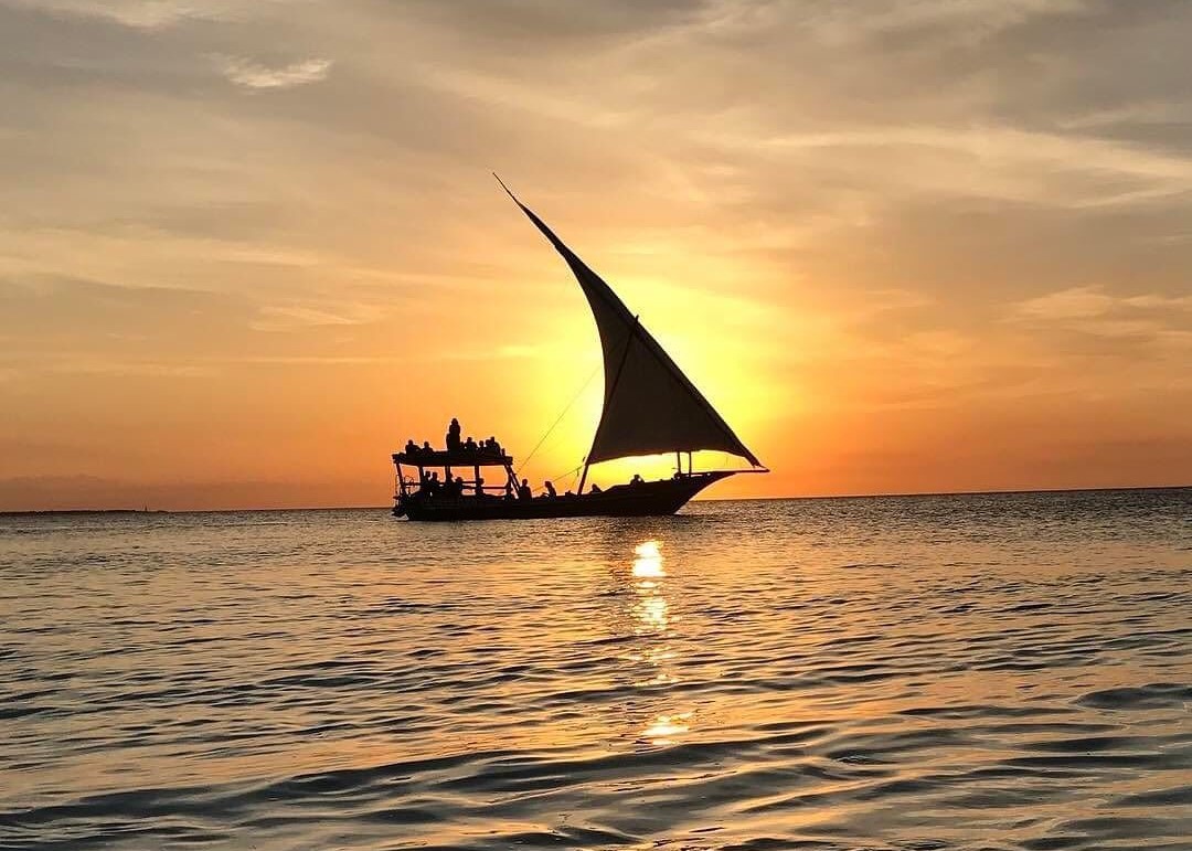 Zanzibar tour guide and traveler exploring local culture